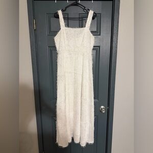 Elegant White Midi Dress with Textured Fabric